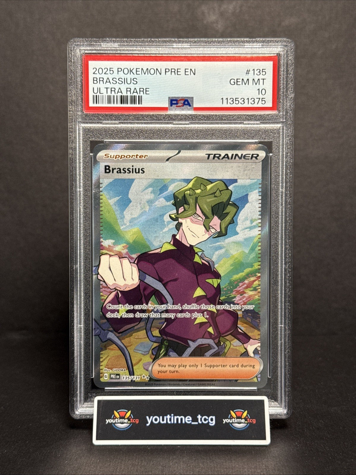2025 Pokemon Pre En-Prismatic Evolutions Ultra Rare Brassius #135 PSA 10